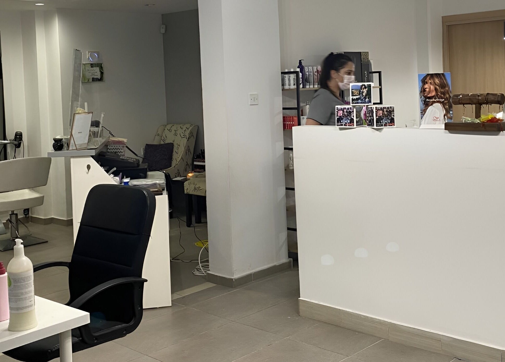 The Cutting Room salon reception and styling area, Mandria, Paphos, CY, showcasing modern design.