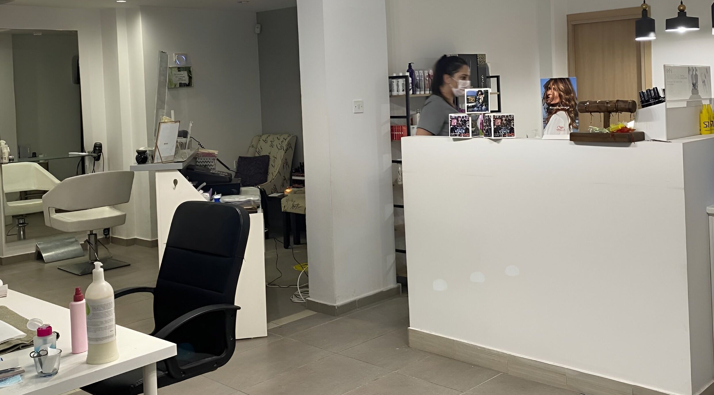 The Cutting Room salon reception and styling area, Mandria, Paphos, CY, showcasing modern design.