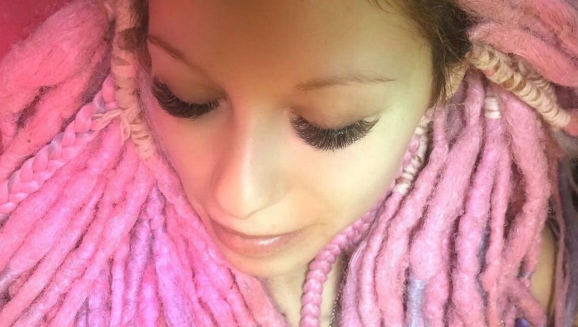 Vibrant pink dreadlocks and lush lashes at In Your Face Glamour, Edmonton, Alberta, CA.