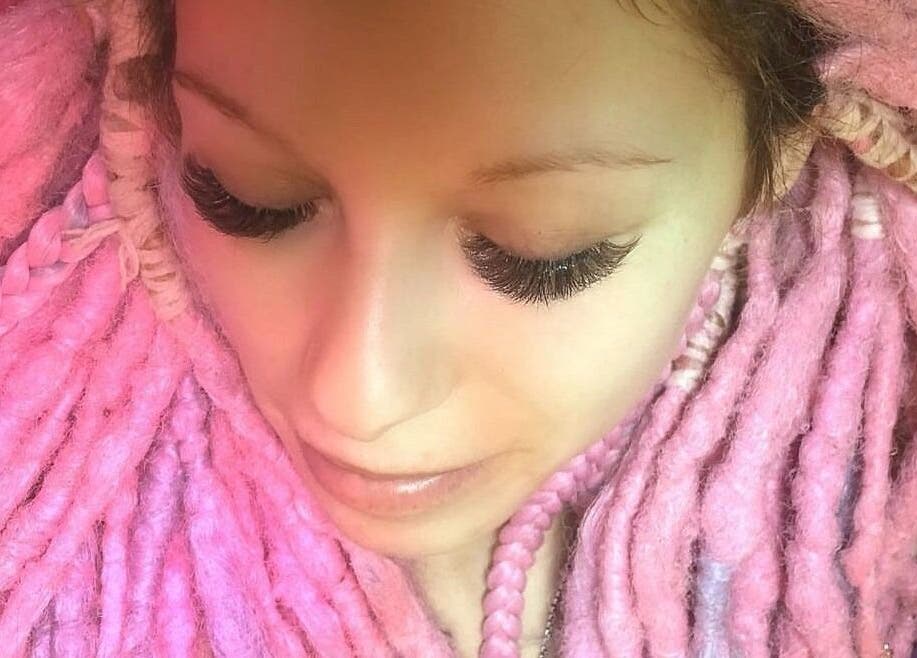 Vibrant pink dreadlocks and lush lashes at In Your Face Glamour, Edmonton, Alberta, CA.