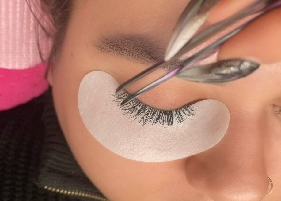 Close-up of eyelash extension application at In Your Face Glamour in Edmonton, Alberta, CA.