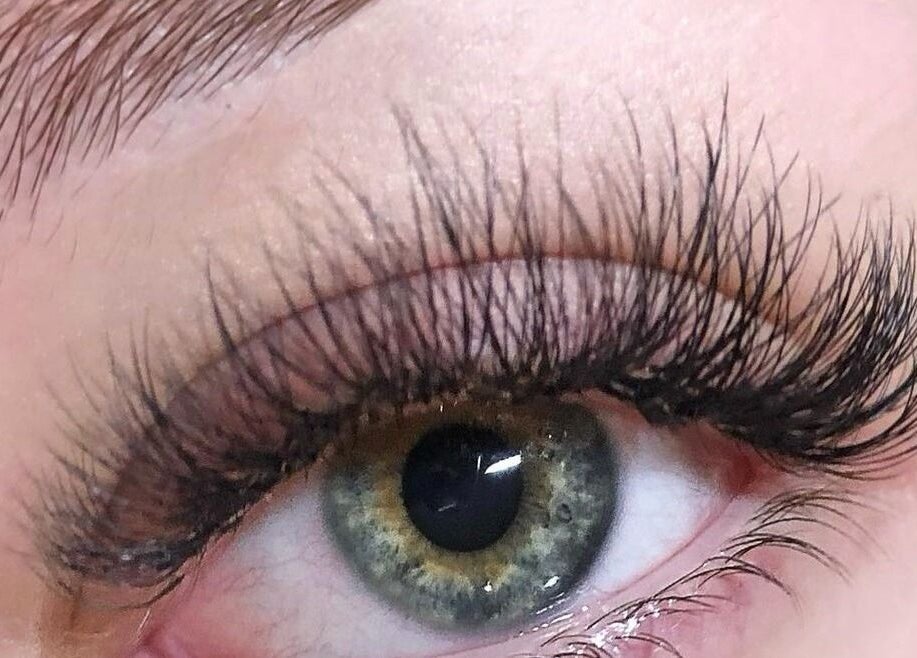 Close-up of lush eyelashes at In Your Face Glamour, Edmonton, Alberta, CA. Perfect beauty enhancement.
