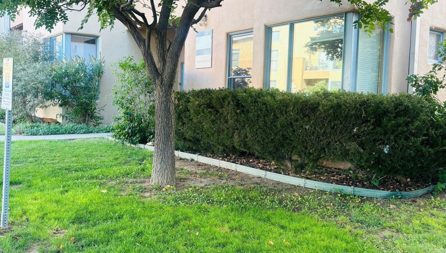 Charming garden view outside Nova Beauty Boutique by Lupita Benavente, Santa Fe, New Mexico, US.