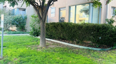 Charming garden view outside Nova Beauty Boutique by Lupita Benavente, Santa Fe, New Mexico, US.