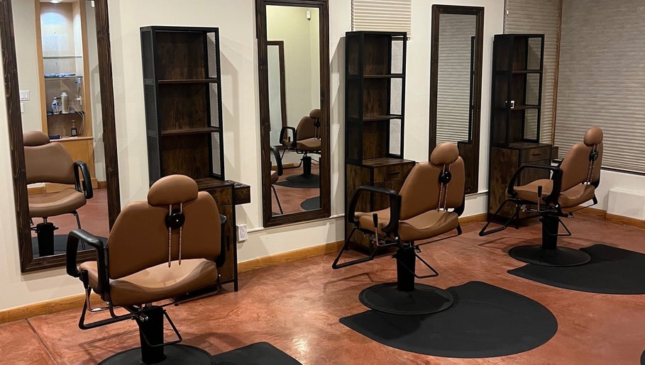 Stylish hair salon at Nova Beauty Boutique by Lupita Benavente in Santa Fe, New Mexico, US with elegant chairs.