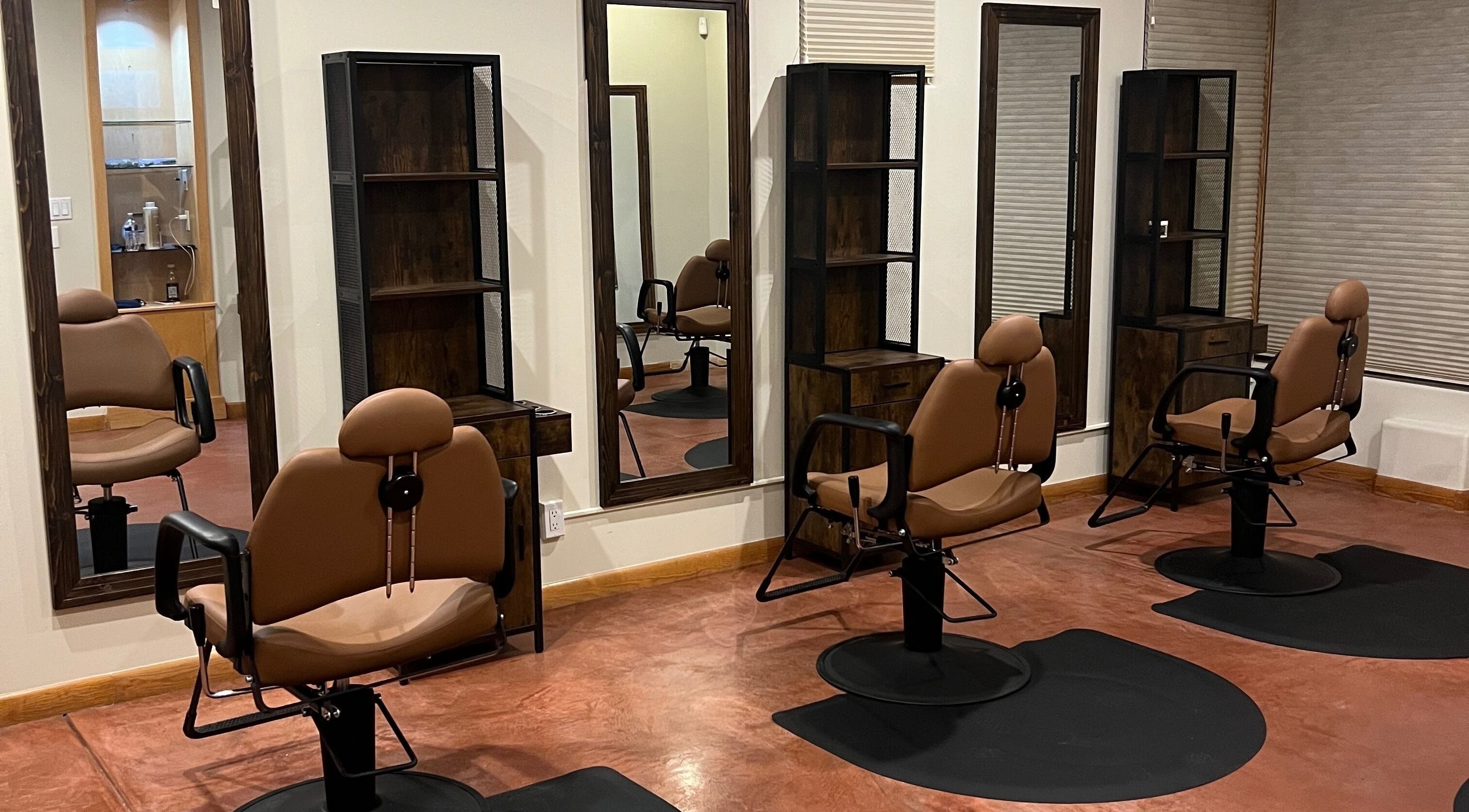 Modern salon chairs at Nova Beauty Boutique by Lupita Benavente, Santa Fe, New Mexico, US.