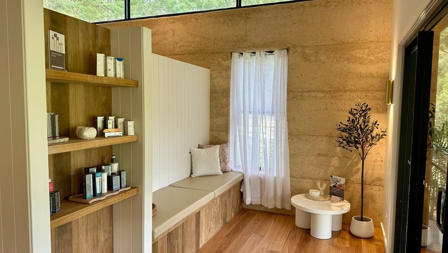Cozy corner with seating at Divine Beauty House, Charlotte Bay, New South Wales, AU.