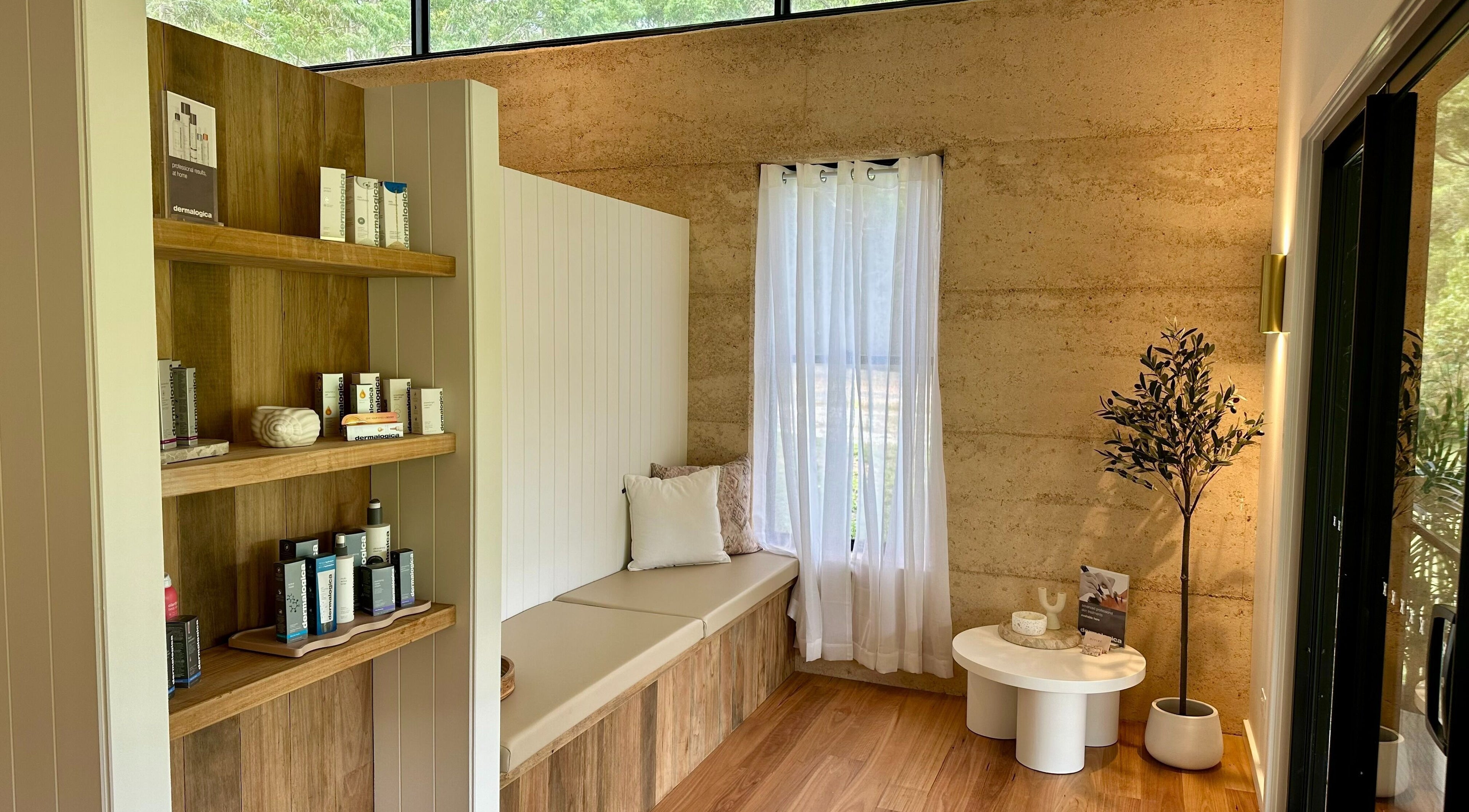 Cozy corner with seating at Divine Beauty House, Charlotte Bay, New South Wales, AU.