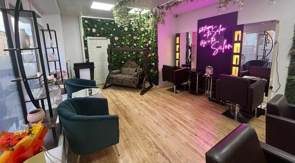 Interior of L’ammaya Hair and Beauty in Burnley, GB, featuring elegant decor and stylish seating.