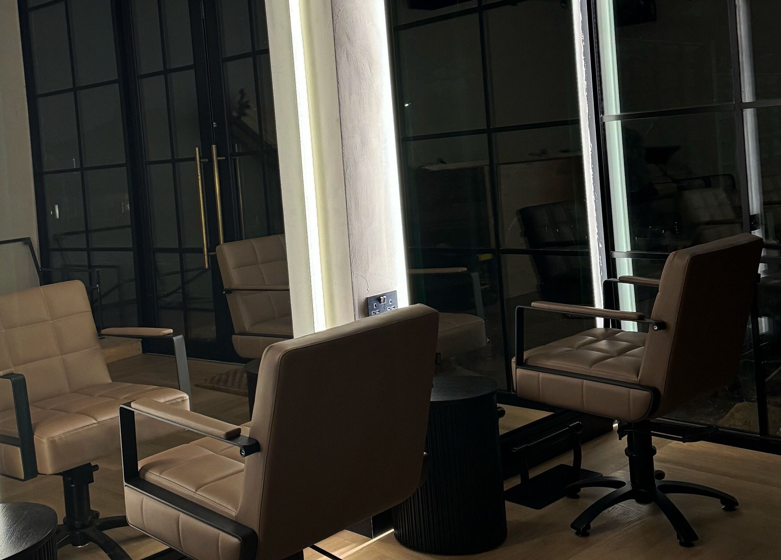 Chic salon chairs and mirrors at Signature Skin, Swinton, England, GB, offering a relaxing atmosphere.