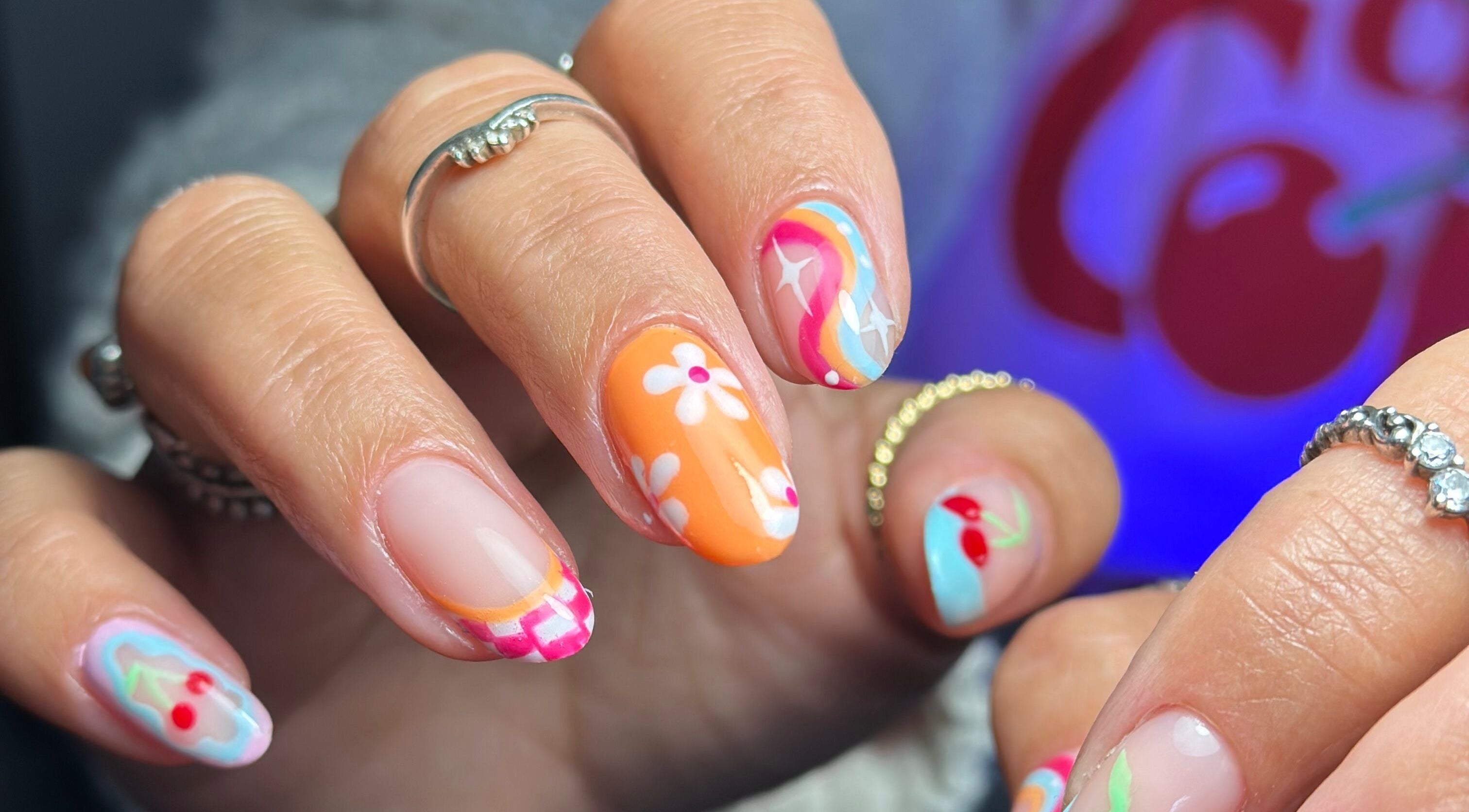 Stylish nail art featuring vibrant designs at Oh Nails by Lauren, Livingston, Scotland, GB.