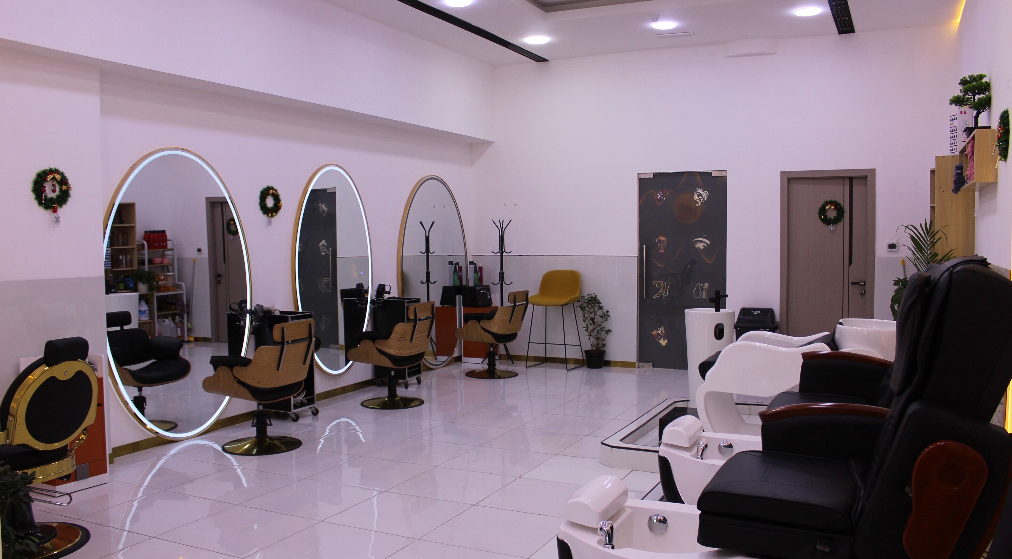 Modern interior of Companion Beauty Salon @Madina Mall -1st Floor, Dubai, Dubai, AE with stylish chairs and mirrors.