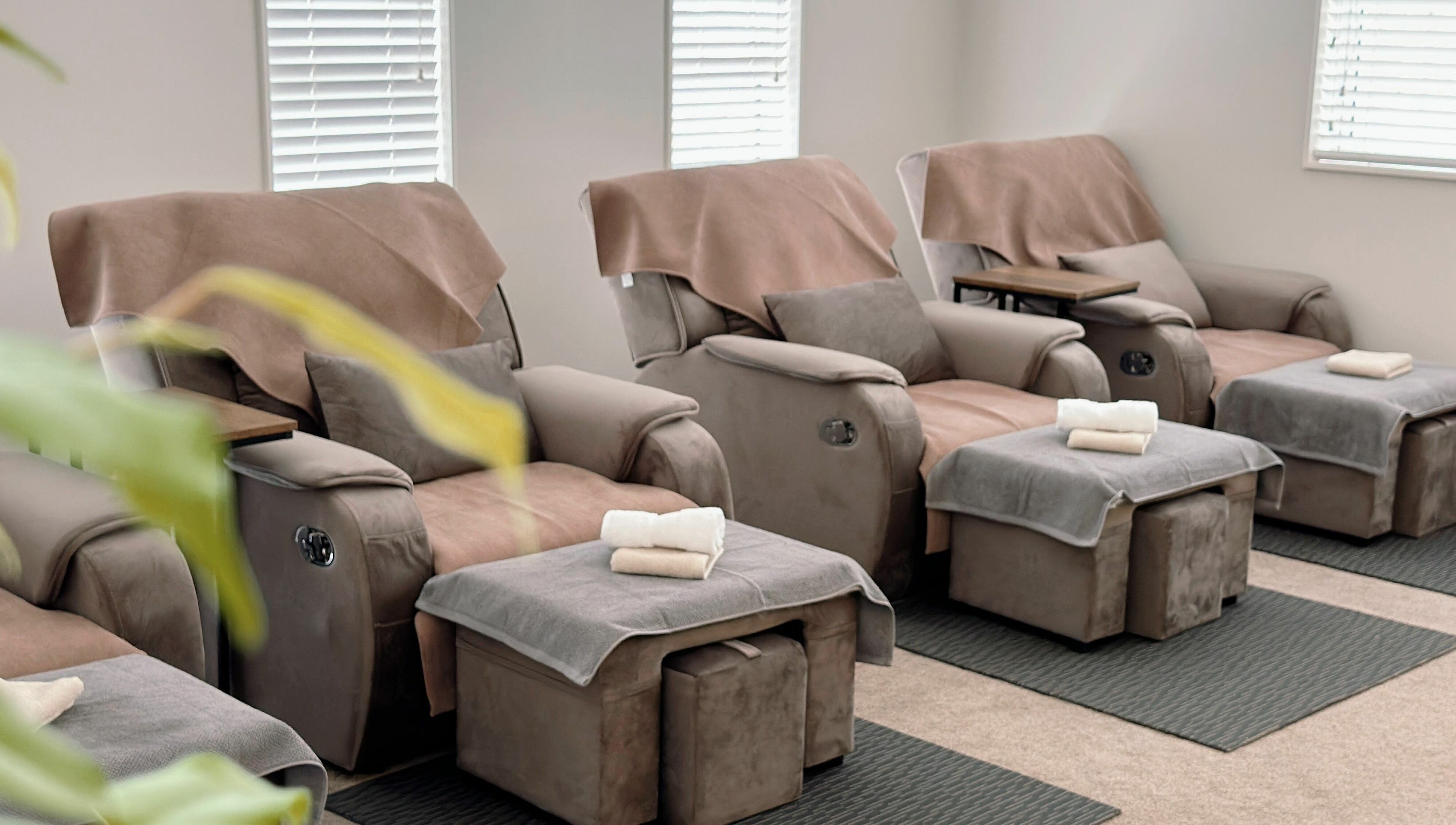 Luxurious massage chairs at Wellness Massage Silverdale, Silverdale, Auckland, NZ await relaxation seekers.