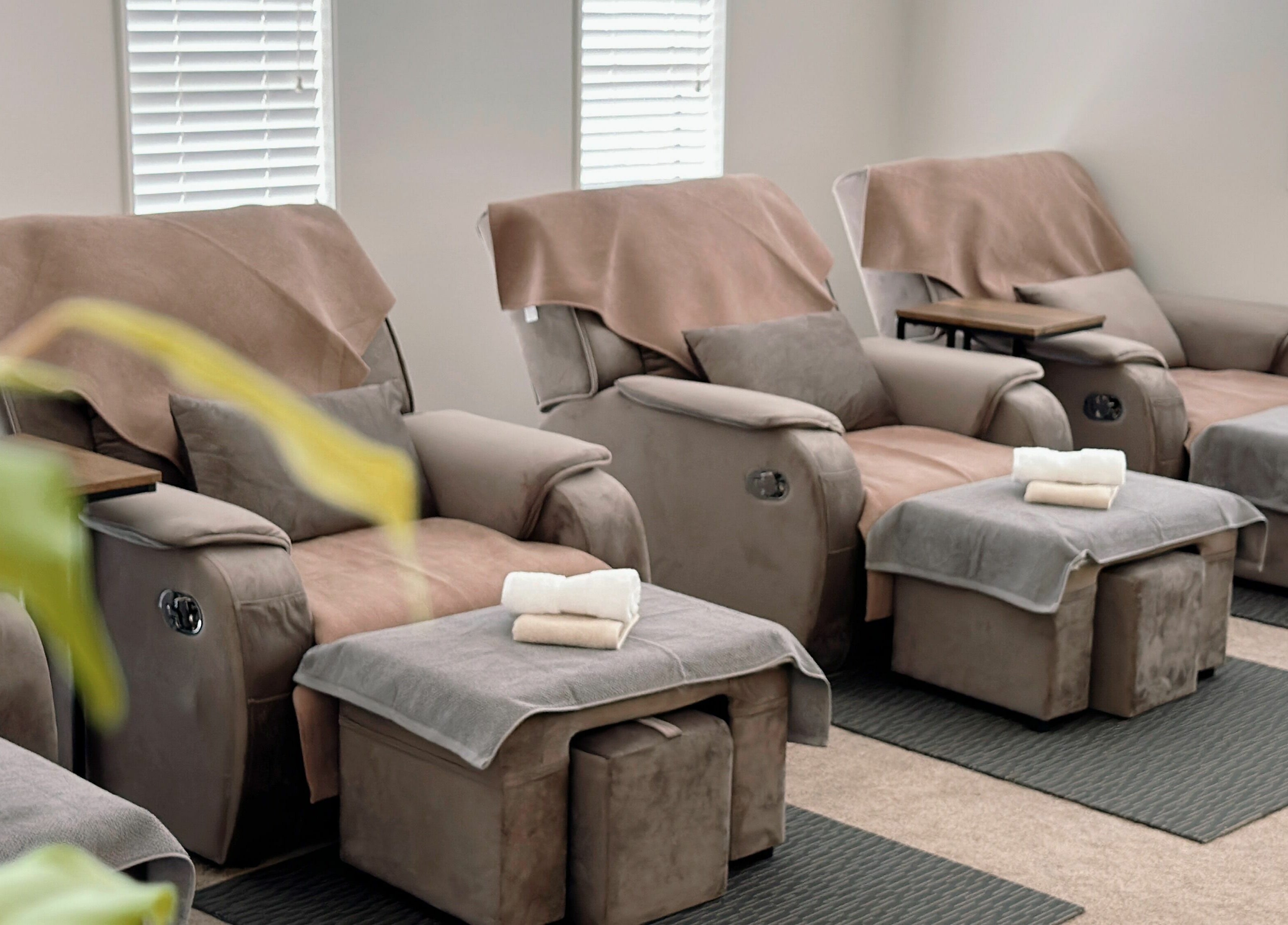 Luxurious massage chairs at Wellness Massage Silverdale, Silverdale, Auckland, NZ await relaxation seekers.