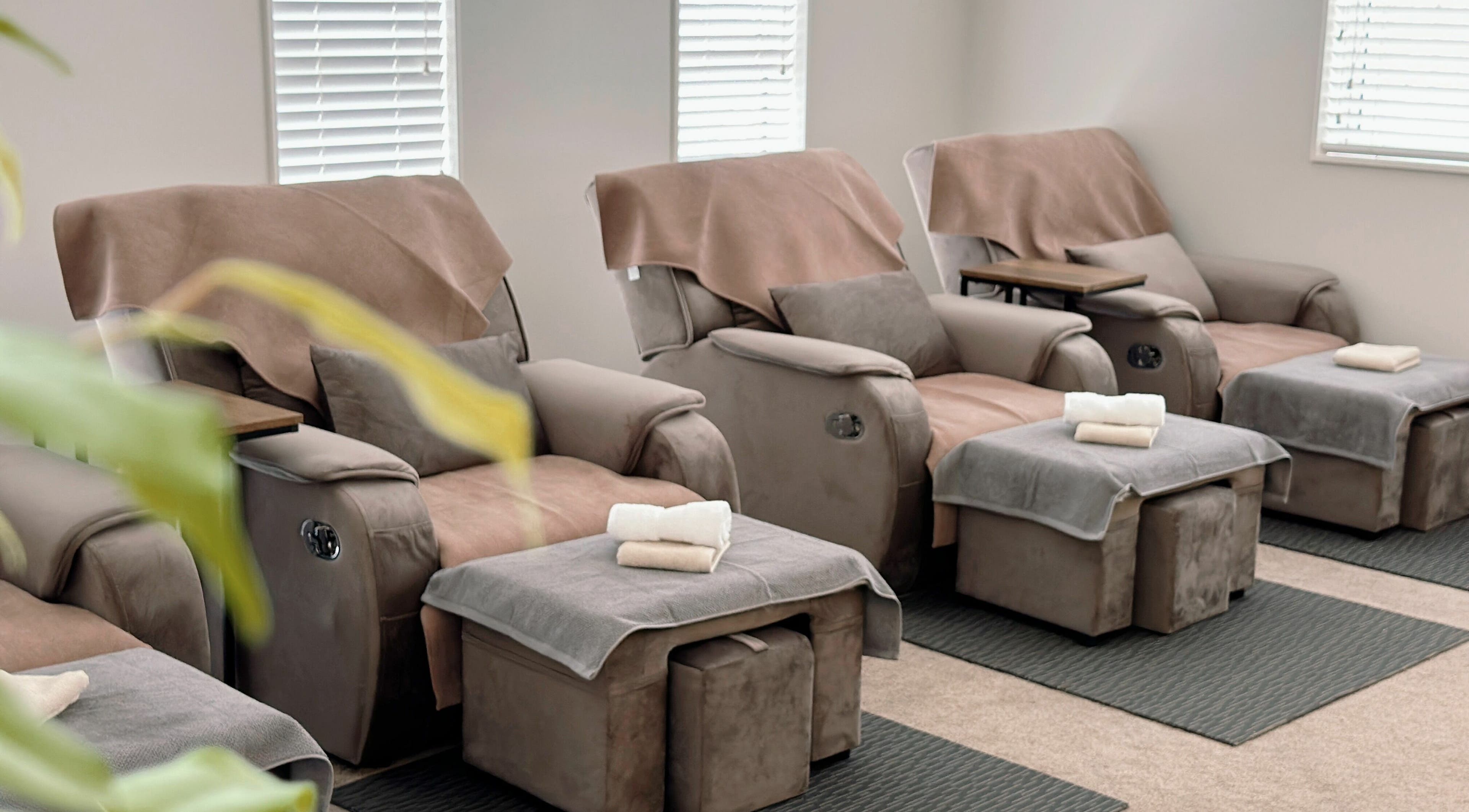 Luxurious massage chairs at Wellness Massage Silverdale, Silverdale, Auckland, NZ await relaxation seekers.