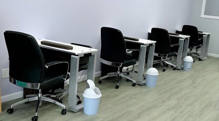 Spacious manicure stations at Violetta Beauty Studio in White Plains, New York, US, ready for clients.