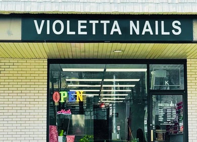 Front view of Violetta Beauty Studio in White Plains, New York, US, showcasing the vibrant entrance.