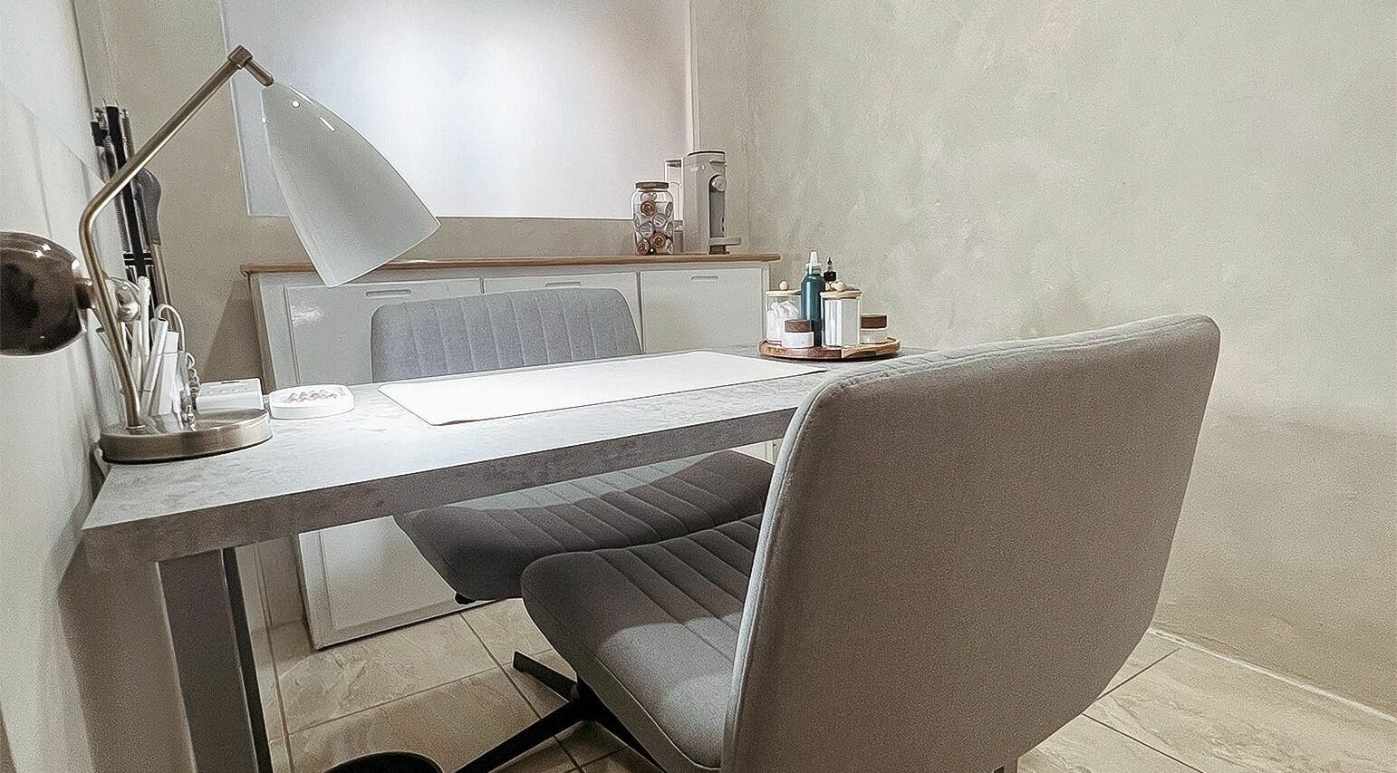 Elegant nail station at Taiyo Nails in Kingston, St. Andrew Parish, JM, featuring modern decor and lighting.