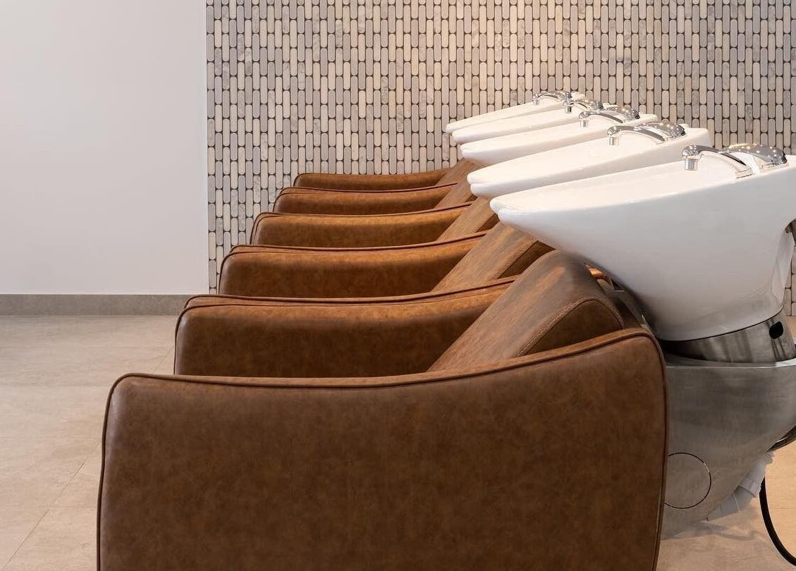 Luxurious washing stations at Mane Painters in Kingsgrove, NSW, AU, showcasing comfort and style.