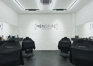 Modern interior of Menspire Kuala Lumpur with stylish barber chairs, located in KUALA LUMPUR, WILAYAH PERSEKUTUAN KUALA LUMPUR, MY.