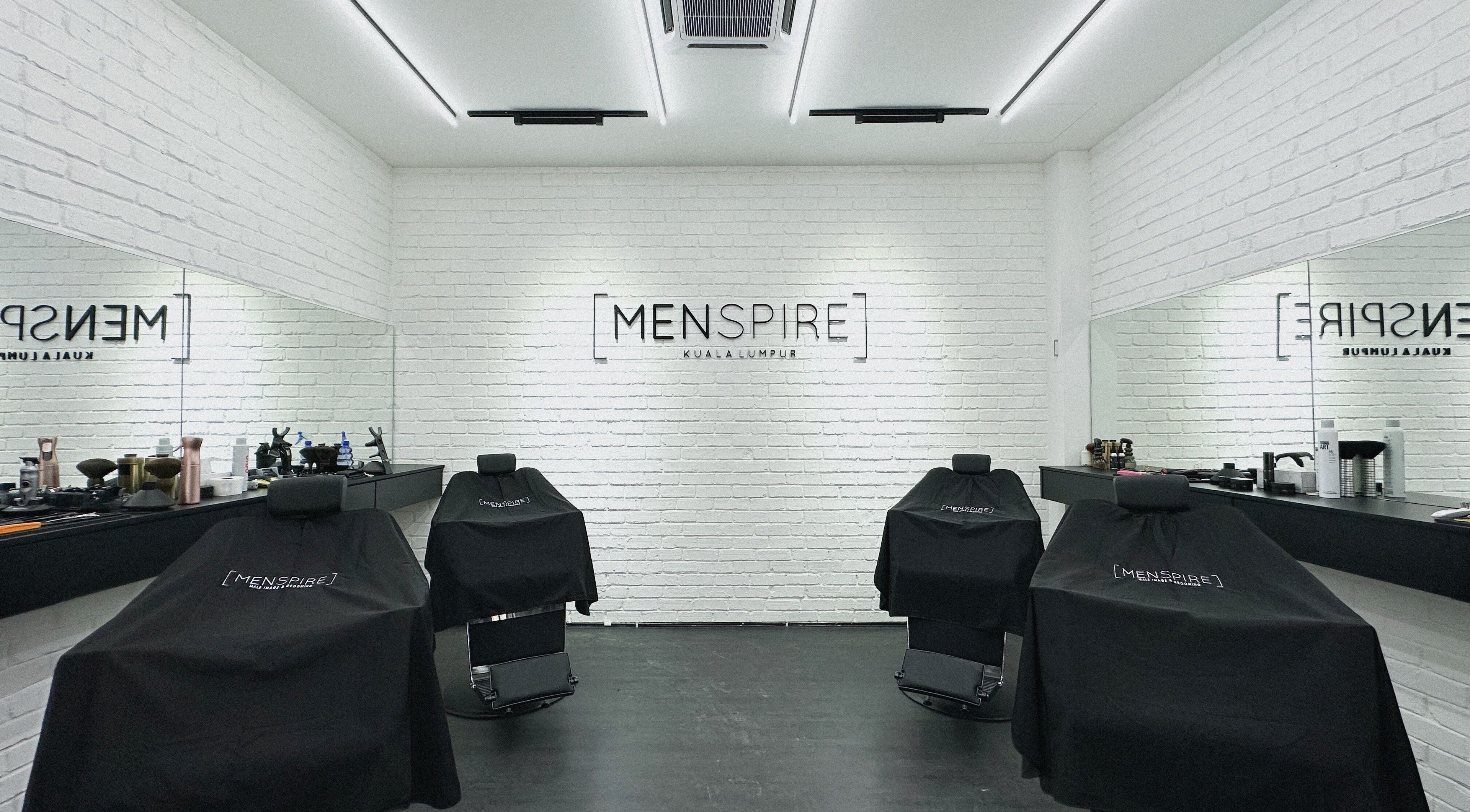 Modern interior of Menspire Kuala Lumpur with stylish barber chairs, located in KUALA LUMPUR, WILAYAH PERSEKUTUAN KUALA LUMPUR, MY.