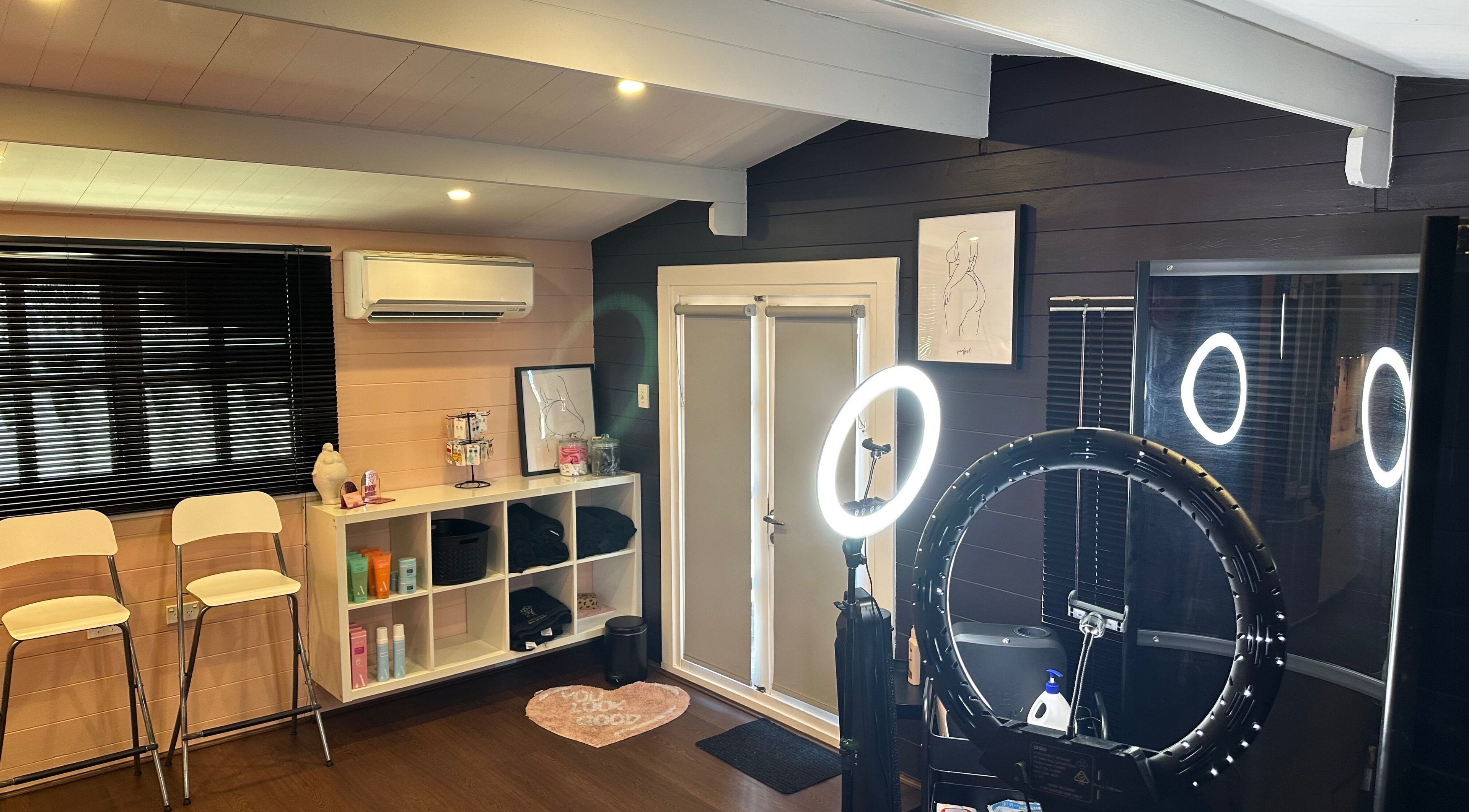 Interior of Bronzed Body Spray Tan Studio, Port Kennedy, Western Australia, AU with modern decor and lighting.