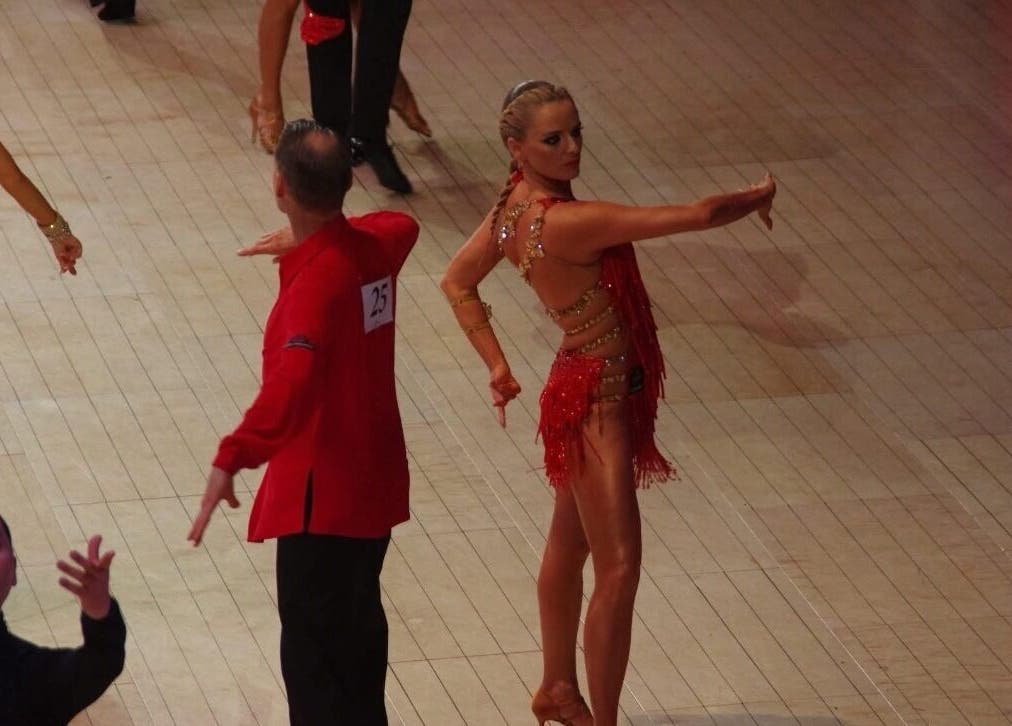 Dance performance on wooden floor, reflecting beauty at Bronzed Body Spray Tan Studio, Port Kennedy, WA, AU.
