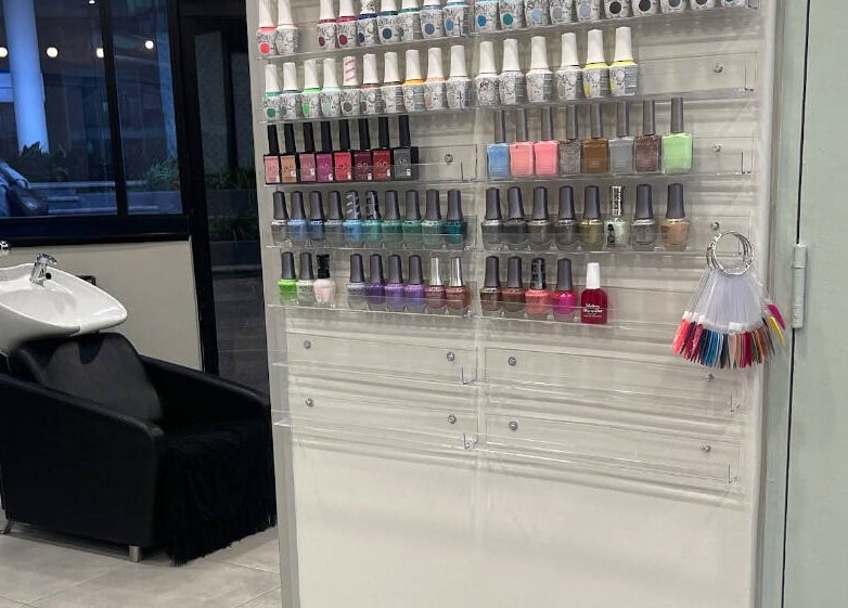 Colorful nail polish selection at KimCo Beauty Lab, Sandton, Gauteng, ZA. Perfect spot for a pampering session.