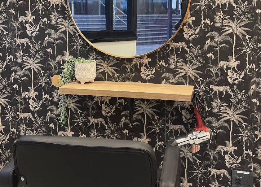 KimCo Beauty Lab's stylish jungle-themed salon spot in Sandton, Gauteng, ZA with chic decor and accessories.