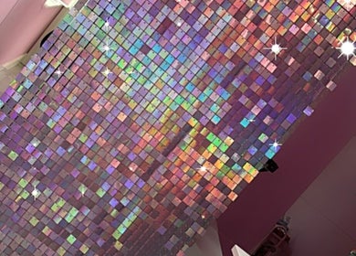 Shimmering mosaic wall at Beauty and Aesthetics Lodge, London Colney, England, GB. Vibrant, colorful decor.