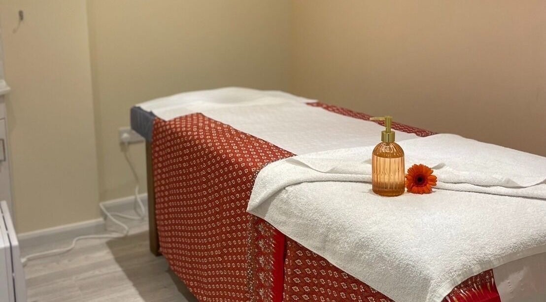Peaceful massage room at Sunrise Thai Massage - Bermondsey London, showcasing a massage bed with elegant decor in London, England, GB.