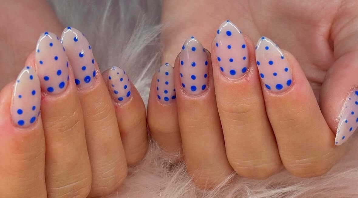 Bright blue polka dot manicure at Shannon Nicole Studio, Tredegar, Wales, GB.