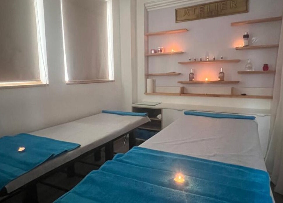 Cozy massage room at Cosmetic Island Port Louis, Port Louis, Port Louis District, MU with soft lighting and treatment beds.