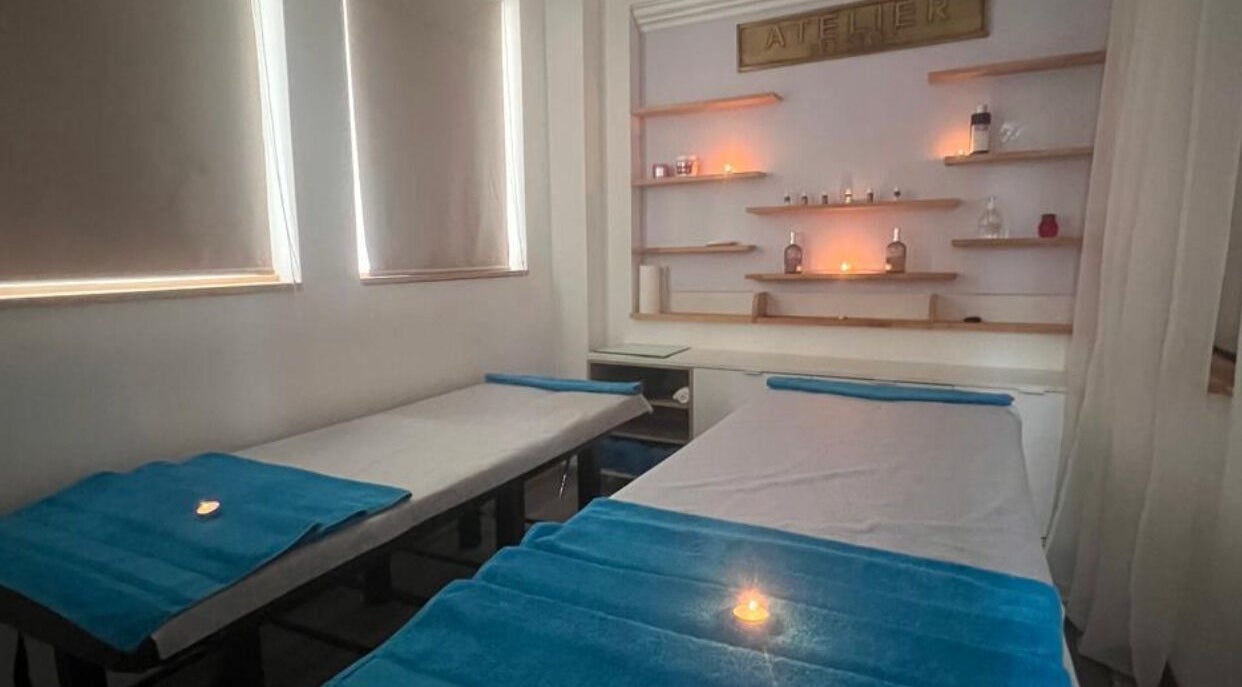 Cozy massage room at Cosmetic Island Port Louis, Port Louis, Port Louis District, MU with soft lighting and treatment beds.