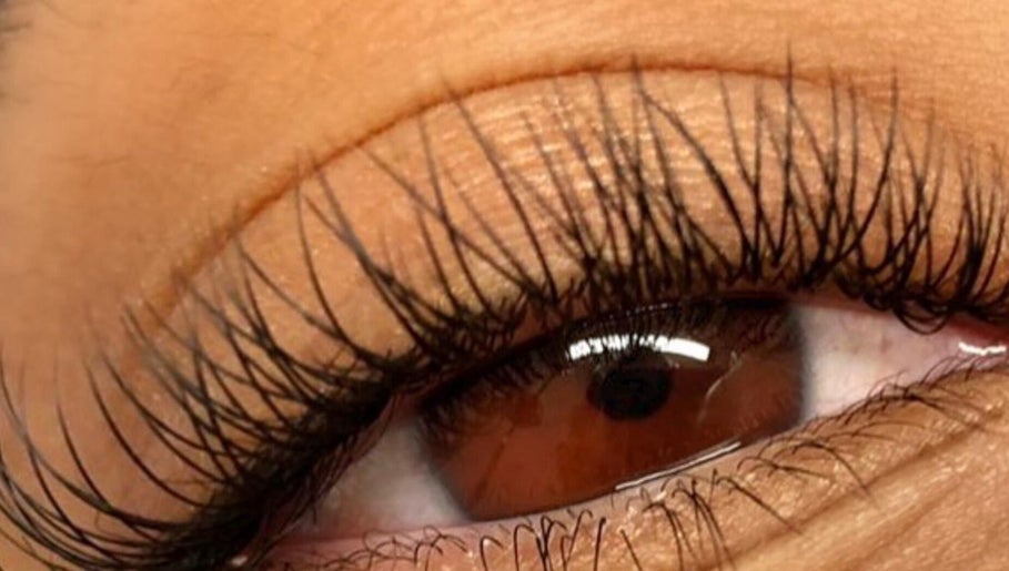 Close-up of expertly styled lashes at Inv Beauty Bar in Toronto, Ontario, CA highlighting natural beauty.