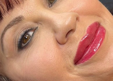 Close-up of vibrant lips and flawless skin at Inv Beauty Bar, Toronto, Ontario, CA, showcasing expert beauty work.