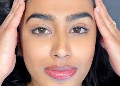 Close-up of a serene face after treatment at Inv Beauty Bar, Toronto, Ontario, CA.