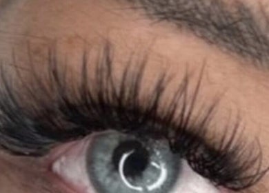 Close-up of elegant eyelash extensions at Inv Beauty Bar, Toronto, Ontario, CA for a stunning look.