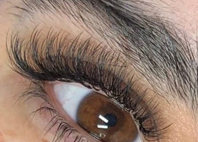Closeup of lush eyelash extensions at Inv Beauty Bar, Toronto, Ontario, CA for elegant eye beauty.