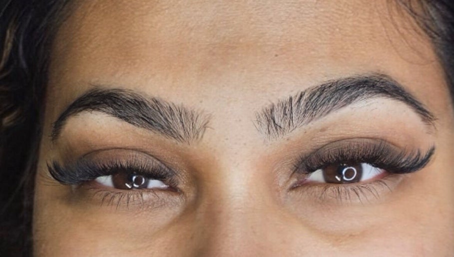 Close-up of perfectly shaped brows and lashes at Inv Beauty Bar in Toronto, Ontario, CA.