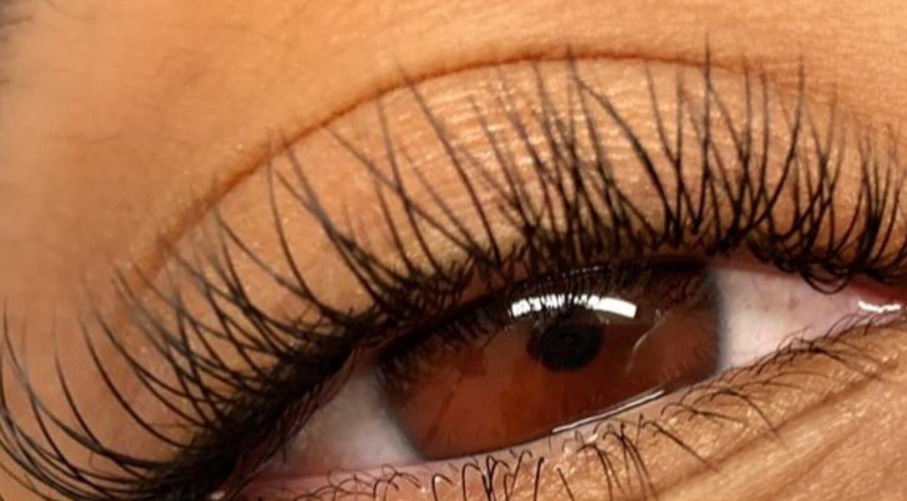 Close-up of expertly crafted eyelashes at Inv Beauty Bar, Toronto, Ontario, CA, showcasing stunning lash work.