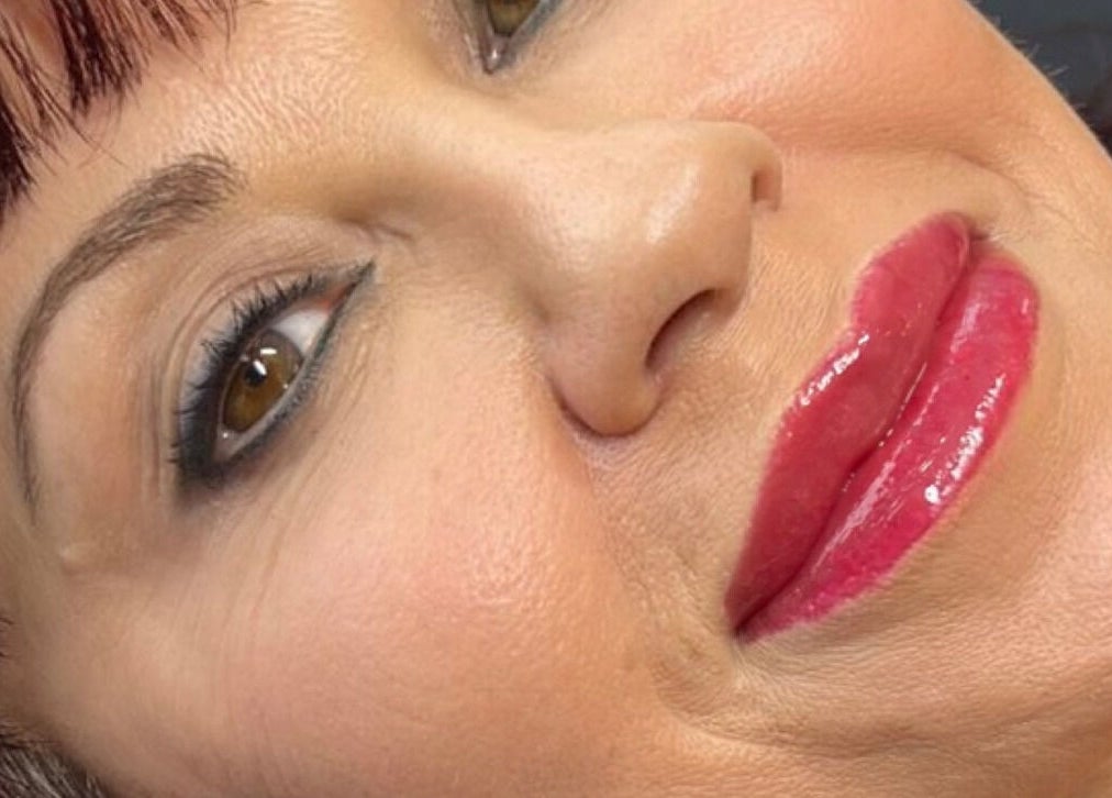 Close-up of a woman's face showcasing makeup at Inv Beauty Bar, Toronto, Ontario, CA.