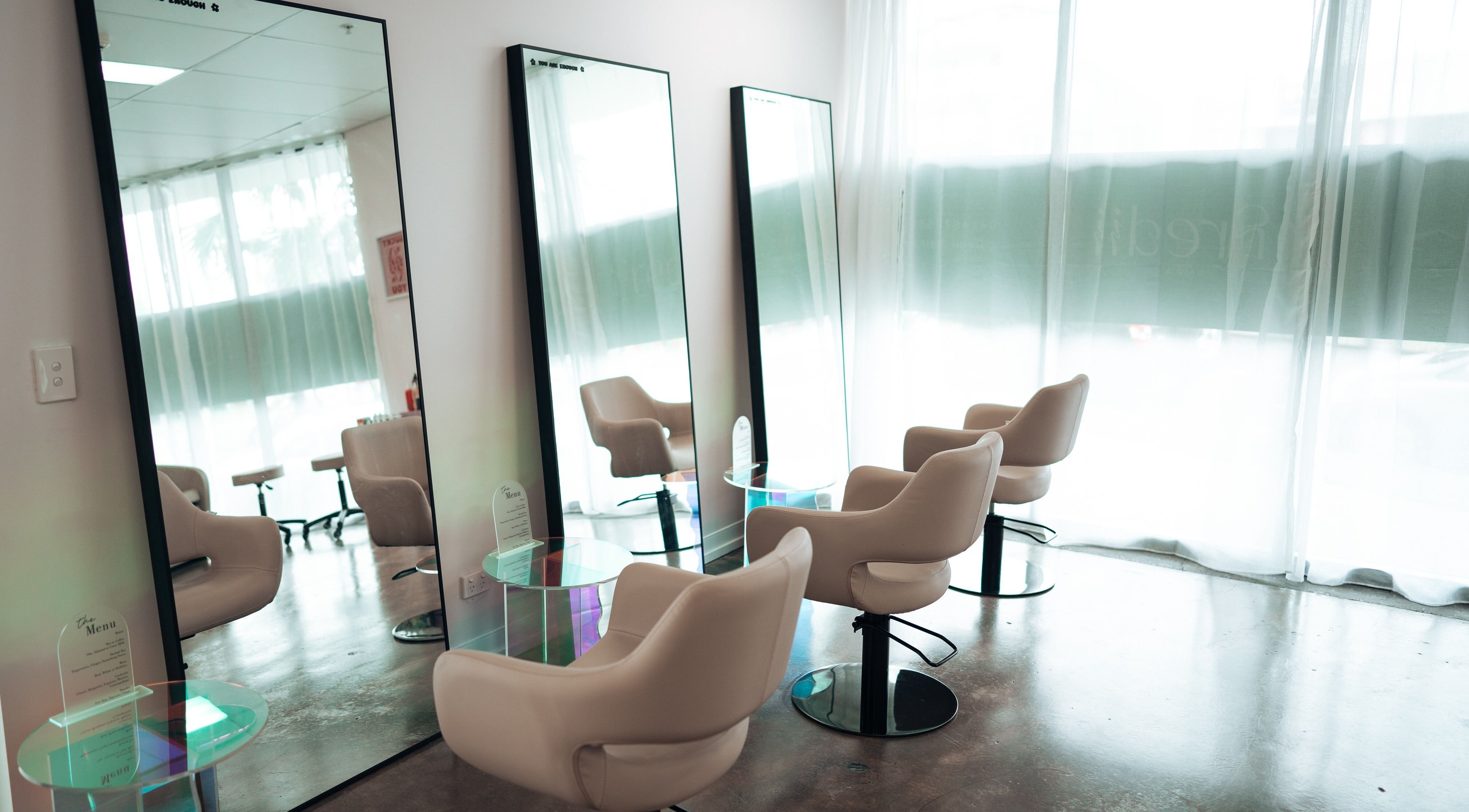 Modern salon chairs and mirrors at Fredii Hair.Co - By Syd in Maroochydore, Queensland, AU.