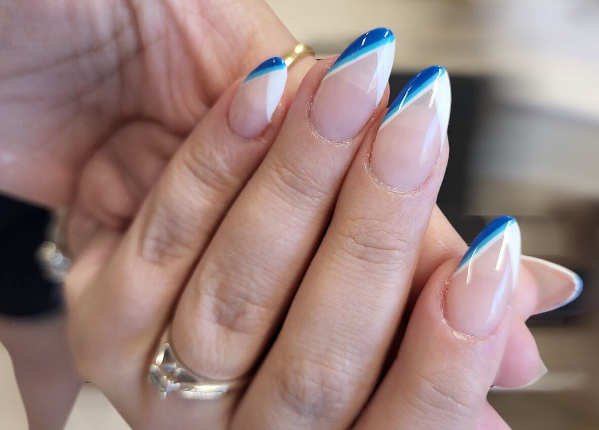 Elegant blue-tipped nails at Hey Nails by Winn, Benowa, Queensland, AU showcase chic manicure style.