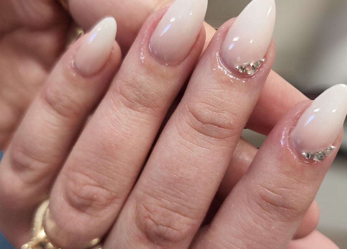 Elegant manicure with gems by Hey Nails by Winn, Benowa, Queensland, AU. Flawless and stylish nail design.