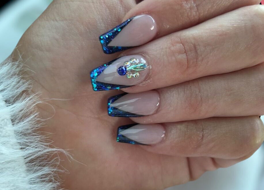 Glittery nail art at Hey Nails by Winn, Benowa, Queensland, AU. Stunning blue sparkle designs.
