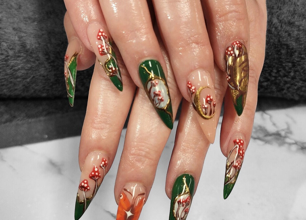 Exquisite nail art with green and gold accents at Hey Nails by Winn, Benowa, Queensland, AU.