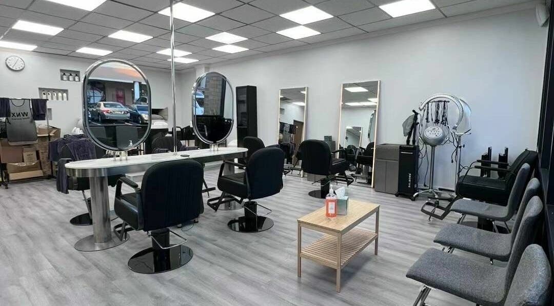 Modern interior of K MA Salon Convoy, San Diego, California, US, featuring styling chairs and sleek mirrors.