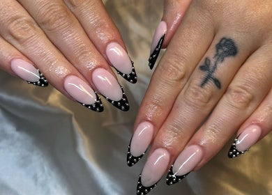 Close-up of elegant black and pink nail art at CW and Co, Melbourne, Victoria, AU.
