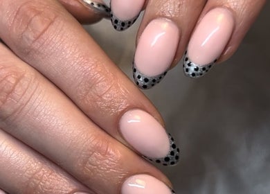 Chic polka dot nail art manicure at CW and Co in Melbourne, Victoria, AU offering premium beauty services.